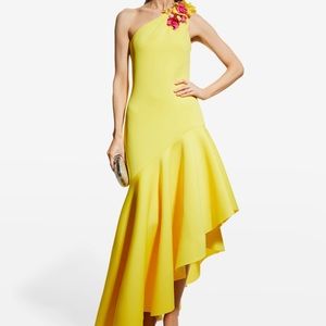 floor-length one-shoulder gown with pink and yellow floral embellishments.